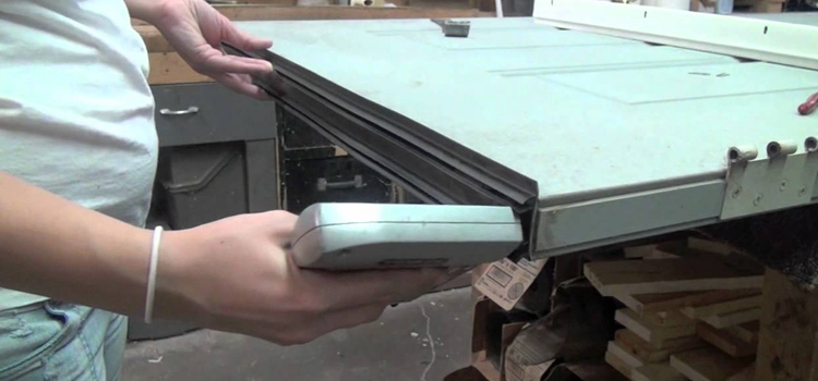 damaged steel door repair St. John's